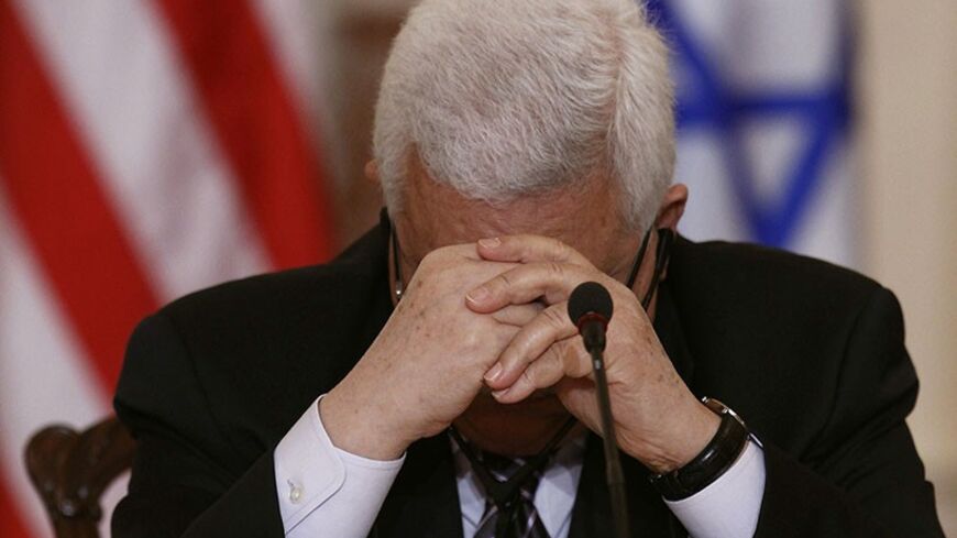 Palestinian President Mahmoud Abbas listens to remarks about the Middle East peace talks at the State Department in Washington, September 2, 2010. REUTERS/Jim Young (UNITED STATES - Tags: POLITICS) - RTR2HU8I