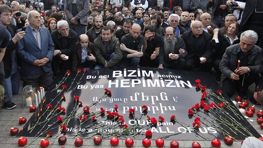 Human rights activists light candles to mourn Armenian victims in central Istanbul April 24, 2010, during a demonstration to commemorate the 1915 mass killing of Armenians in the Ottoman Empire. Muslim Turkey accepts many Christian Armenians died in partisan fighting beginning in 1915 but denies that up to 1.5 million were killed and that it amounted to genocide, a term used by some Western historians and foreign parliaments. REUTERS/ Osman Orsal (TURKEY RELIGION - Tags: CRIME LAW CIVIL UNREST SOCIETY POLIT