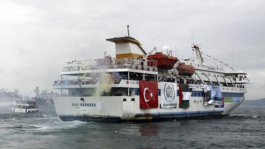 Turkish cruise ship Mavi Marmara, carrying pro-Palestinian activists and humanitarian aid to Gaza, leaves from Sarayburnu port in Istanbul May 22, 2010. The ship, sponsored by Turkey's Islamic and pro-Palestinian rights group, The Foundation for Human Rights and Freedoms and Humanitarian Relief (IHH), will join an international flotilla aiming to break Gaza blockade expected to sail at the end of May. REUTERS/Emrah Dalkaya (TURKEY - Tags: POLITICS) - RTR2E8IC
