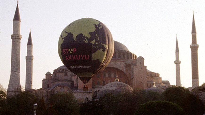 TURKEY-GREENPEACE:ISTANBUL,10APR00-Greenpeace activists fly a hot air balloon sporting a slogan in Turkish reads as "Stop Akkuyu" in front of sixth century Byzantinian church of St. Sophia as they demonstrate in the old city in Istanbul April 10 against the Turkish government decision to build a first ever nuclear plant in Akkuyu. Turkish police detained nine activists during the protest.

FS - RTR3057