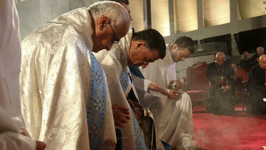 Patriarch of Lebanese Christian Maronites Bishara Boutros al-Rai (C) prays along with other clerics for peace in Syria, in Harisa, Jounieh September 7, 2013. REUTERS/Hasan Shaaban (LEBANON - Tags: RELIGION POLITICS CIVIL UNREST) - RTX13BZL