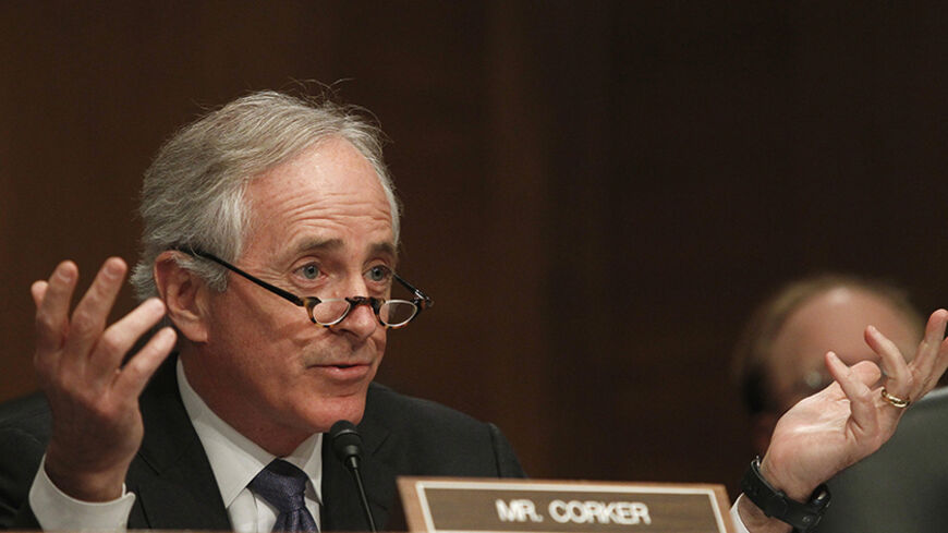 Senator Bob Corker (R-TN) questions members of the panel testifying before the Senate Banking, Housing and Urban Affairs Committee in Washington February 14, 2013. U.S. lawmakers pressed financial regulators on Thursday on their efforts to crack down on Wall Street after the 2007-2009 financial crisis, which a new government report said may have cost the U.S. economy more than $10 trillion.  
REUTERS/Gary Cameron (UNITED STATES - Tags: POLITICS BUSINESS) - RTR3DSVG