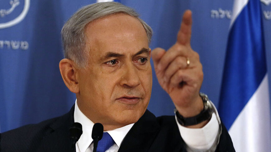 Israeli Prime Minister Benjamin Netanyahu gestures as he speaks during a news conference at the defense ministry in the Israeli coastal city of Tel Aviv July 11, 2014. Netanyahu said on Friday Israel has attacked more than 1,000 targets during a four-day-old offensive against Gaza militants and that "there are still more to go". REUTERS/Gali Tibbon/Pool (ISRAEL - Tags: POLITICS CIVIL UNREST CONFLICT HEADSHOT) - RTR3Y7EB