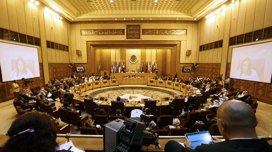A general view of the venue during an extraordinary session of the Arab League at the league's headquarters in Cairo July 14, 2014. Egypt launched an initiative on Monday to halt fighting between Israel and Palestinian militants, proposing a ceasefire to be followed by talks in Cairo on settling the conflict in which Gaza authorities say more than 170 people have died. REUTERS/Amr Abdallah Dalsh (EGYPT - Tags: POLITICS CIVIL UNREST) - RTR3YNOV