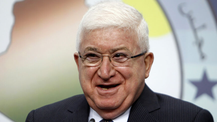 Fouad Masoum, Iraq's newly elected president, smiles during a news conference in Baghdad, July 24, 2014. Iraq's parliament elected senior Kurdish politician Fouad Masoum as president of the country on Thursday, the second step in the process of forming a government. Iraq's politicians have been in deadlock over forming a new government since an election in April. The next step, choosing a prime minister, may prove far more difficult.  REUTERS/Ahmed Saad (IRAQ - Tags: POLITICS HEADSHOT ELECTIONS) - RTR3ZZ70