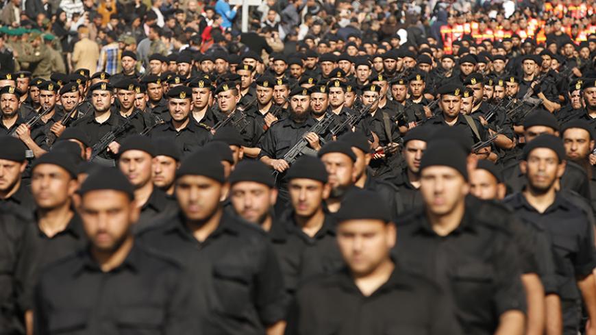 Members of the Palestinian security forces loyal to Hamas movement take part in a parade marking the fifth anniversary of the three-week offensive Israel launched in 2008-2009, in Gaza City January 13, 2014. REUTERS/Mohammed Salem (GAZA - Tags: POLITICS MILITARY ANNIVERSARY) - RTX17CGS