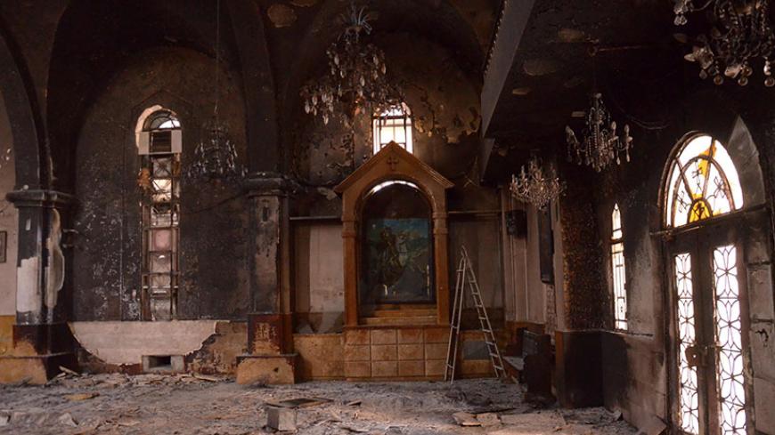 The Armenian St. Kevork Church (Saint George) is seen in the northern Syrian city of Aleppo, on October 30, 2012, after it was burnt during fighting between rebel fighters and Syrian government forces.   AFP PHOTO/STR        (Photo credit should read STR/AFP/Getty Images)