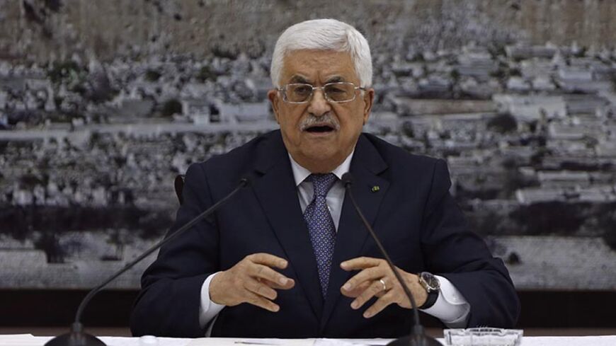 Palestinian President Mahmoud Abbas gestures during a meeting with Palestinian leadership in the West Bank city of Ramallah August 26, 2014. Israel has accepted an Egyptian proposal for a Gaza ceasefire, a senior Israeli official said on Tuesday. Egyptian and Palestinian officials said the truce was to take effect at 7 pm (1600 GMT). REUTERS/Mohamad Torokman (WEST BANK - Tags: POLITICS PROFILE) - RTR43V6L