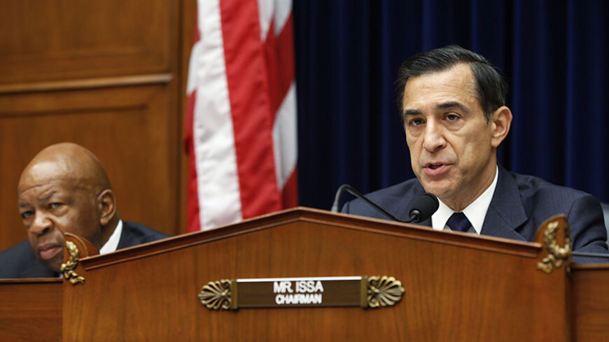 Committee chairman U.S. Representative Darrell Issa (R-CA) (R) holds a House Oversight and Government Reform Committee hearing about e-mails belonging to former IRS official Lois Lerner, on Capitol Hill in Washington June 24, 2014. Republicans accused the U.S. Internal Revenue Service on Monday of hiding emails written by a former senior official and obstructing a congressional inquiry into a controversy involving past IRS treatment of conservative groups.  Also pictured is ranking member Representative Eli