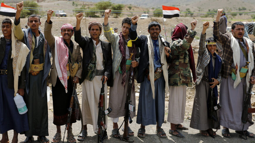 Followers of the Shi'ite Houthi group attend a gathering at the group's camp near Sanaa September 10, 2014. Yemeni soldiers traded gunfire with Shi'ite Muslim rebels near a military base at the southern entrance to the capital Sanaa on Tuesday, residents said, hours after soldiers killed at least four Shi'ite protesters outside the cabinet building. REUTERS/Khaled Abdullah (YEMEN - Tags: POLITICS CIVIL UNREST) - RTR45ODD
