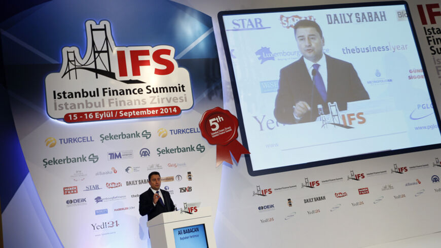Turkey's Deputy Prime Minister Ali Babacan makes a speech during the Istanbul Finance Summit in Istanbul Septemer 16, 2014. Turkey stepped up its criticism of credit rating agencies on Tuesday, with President Tayyip Erdogan warning it could cut ties with Moody's and Fitch and his prime minister saying the country did not have the ratings it deserves. Deputy Prime Minister Babacan, who is responsible for overseeing the economy, joined the chorus, telling a finance conference in Istanbul that objective evalua