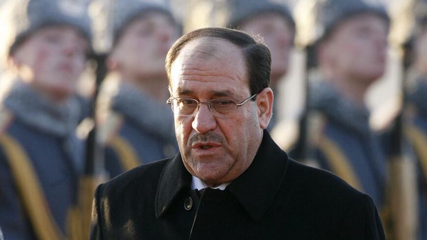 Iraq's Prime Minister Nuri al-Maliki reviews the honour guard upon his arrival in Moscow April 9, 2009. Maliki is to meet Russia's President Dmitry Medvedev during his visit to Russia.  REUTERS/Sergei Karpukhin  (RUSSIA POLITICS) - RTXDTLO