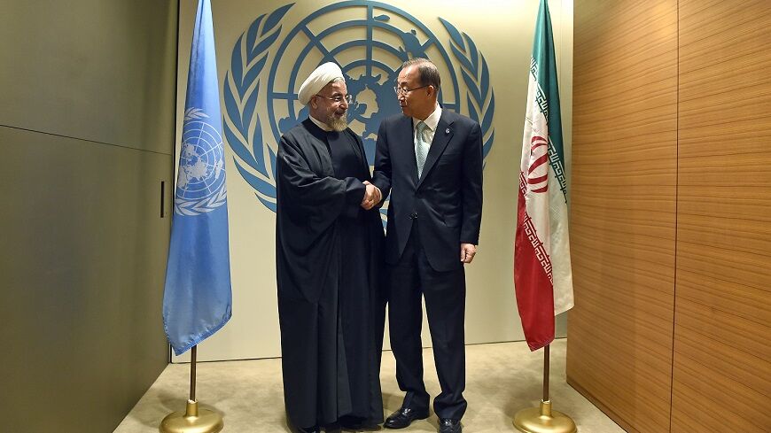 U.N. Secretary-General Ban Ki-moon (R) greets Iran's President Hassan Rouhani before a meeting on the sidelines of the U.N. General Assembly in New York September 23, 2014. REUTERS/Jewel Samad/Pool (UNITED STATES - Tags: POLITICS ENVIRONMENT) - RTR47FMP