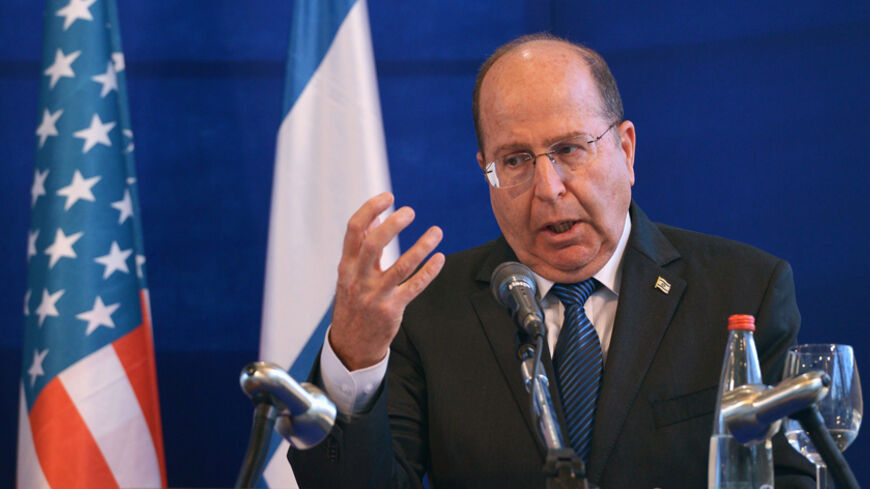 Israeli Defense Minister Moshe Ya'alon speaks during a joint news conference with U.S. Defense Secretary Chuck Hagel (not pictured) at The Kirya, the Israeli Defense Force headquarters, in Tel Aviv May 15, 2014. REUTERS/Mandel Ngan/Pool (ISRAEL - Tags: POLITICS MILITARY) - RTR3PAZF