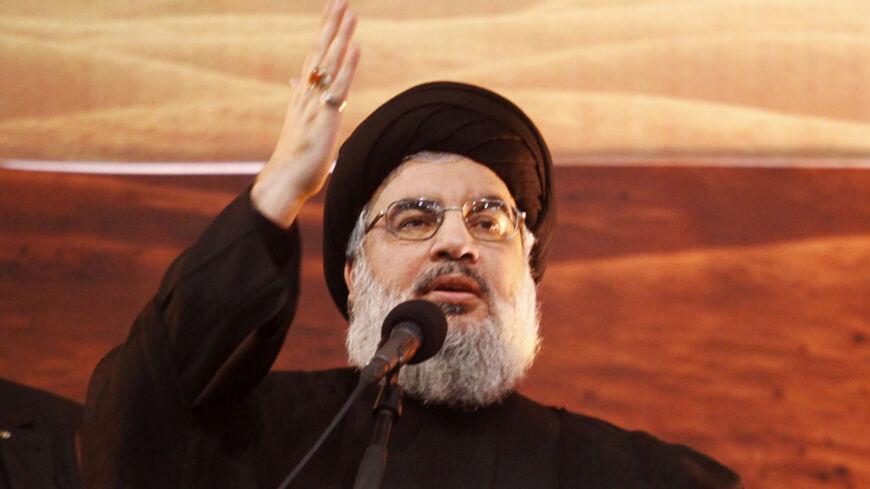 Lebanon's Hezbollah leader Sayyed Hassan Nasrallah addresses his supporters during a rare public appearance at an Ashoura ceremony in Beirut's southern suburbs November 3, 2014. REUTERS/Khalil Hassan (LEBANON - Tags: POLITICS RELIGION) - RTR4COLH
