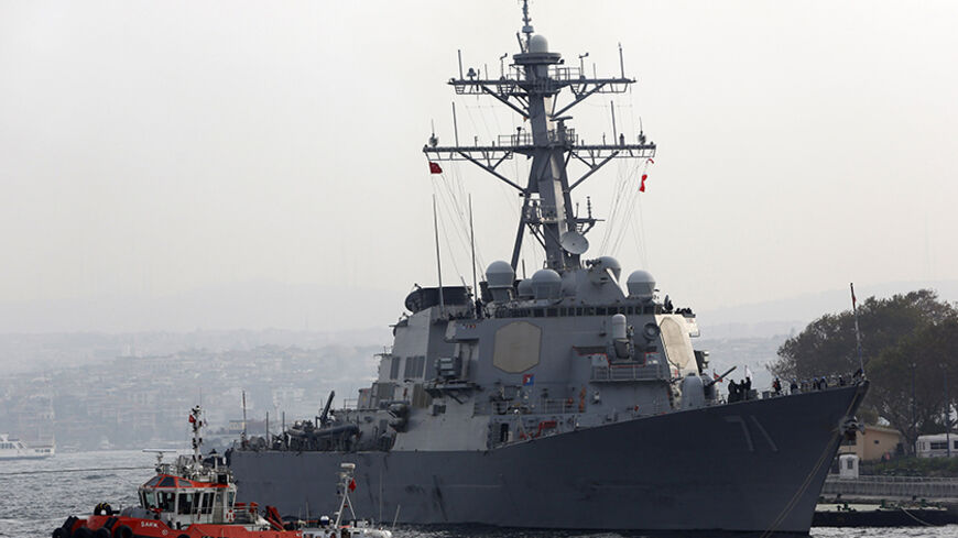 U.S. Navy guided-missile destroyer USS Ross prepares to leave from the port in Istanbul November 13, 2014. A group of Turkish ultra-nationalists attacked three U.S. sailors on a crowded street in Istanbul on Wednesday, shouting "Yankee go home" and trying to pull hoods over their heads in an assault condemned by the United States. The attackers' actions were an apparent reference to an incident in Iraq in July 2003, when U.S. forces detained a Turkish special forces unit, leading its members away for interr