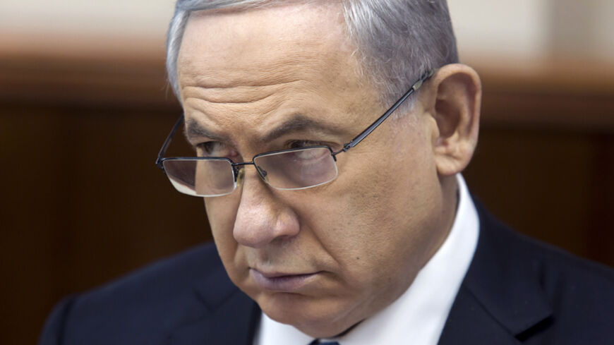 Israel's Prime Minister Benjamin Netanyahu attends the weekly cabinet meeting in Jerusalem November 23, 2014.  REUTERS/Jim Hollander/Pool (JERUSALEM - Tags: POLITICS) - RTR4F81N