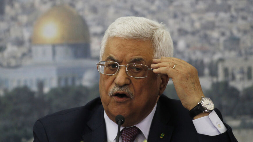 Palestinian President Mahmoud Abbas speaks during a meeting with Israeli students in the West Bank city of Ramallah February 16, 2014. Addressing a sticking point in U.S.-brokered peace talks, Abbas on Sunday dismissed charges by Israeli Prime Minister Benjamin Netanyahu that he wanted to "flood" Israel with Palestinian refugees. REUTERS/Mohamad Torokman (WEST BANK - Tags: POLITICS) - RTX18YI1