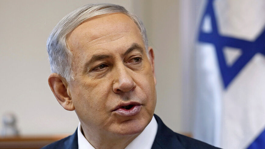 Israeli Prime Minister Benjamin Netanyahu attends the weekly cabinet meeting at his office in Jerusalem December 28, 2014. REUTERS/Gali Tibbon/Pool (JERUSALEM - Tags: POLITICS HEADSHOT) - RTR4JERT