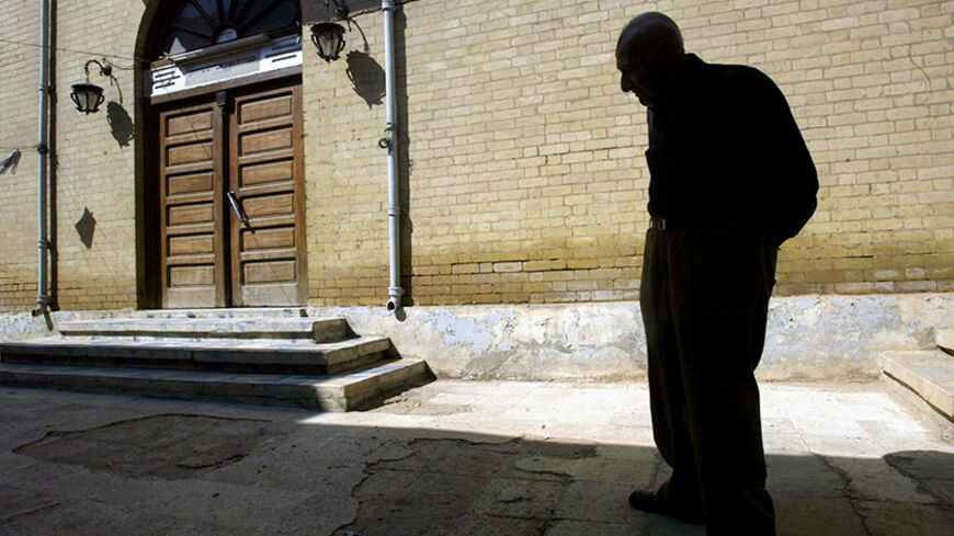 BAGHDAD, IRAQ - APRIL 17:  Iraqi Jew Yusef Salman, 79, stands in front of the synagogue in the tiny remaining Baghdad Jewish community on Passover April 17, 2003 in Baghdad, Iraq. Salman's brothers left Iraq in 1948 and he has not seen them since. He has no remaining family in Iraq. The community members are not formally celebrating the holiday this year due to a lack of electricity, food and other problems associated with the war. The family has lived their entire life in Baghdad while the Jewish community