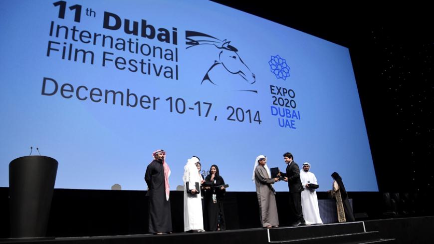 DUBAI, UNITED ARAB EMIRATES - DECEMBER 17:  A general view of award winners with DIFF Chairman Abdulhamid Juma ahead of the Closing Night premiere "Into The Woods" during day eight of the 11th Annual Dubai International Film Festival held at the Madinat Jumeriah Complex on December 17, 2014 in Dubai, United Arab Emirates.  (Photo by Andrew H. Walker/Getty Images for DIFF)