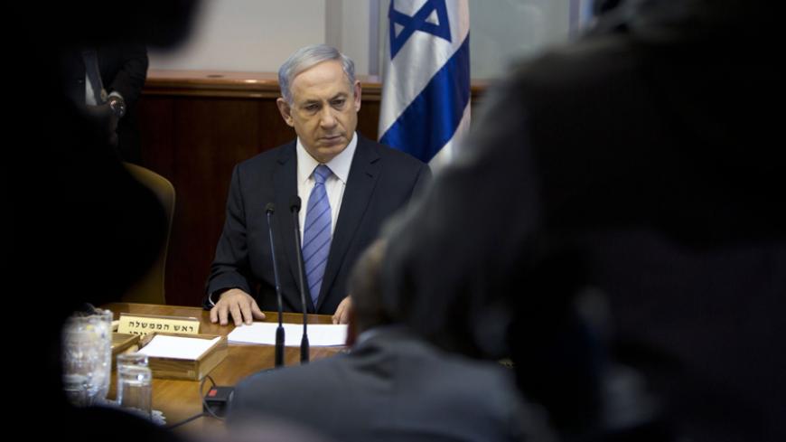 Israel's Prime Minister Benjamin Netanyahu attends the weekly cabinet meeting in his office in Jerusalem January 4, 2015. REUTERS/Oded Balilty/Pool (JERUSALEM - Tags: POLITICS) - RTR4JZXR
