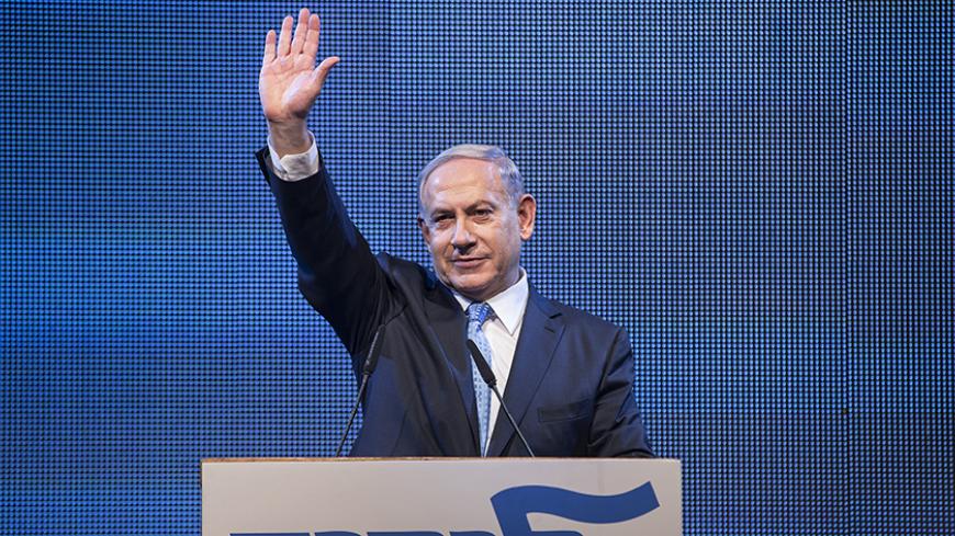 Israel's Prime Minister Benjamin Netanyahu waves after his speech during the launch of his Likud party election campaign in Tel Aviv January 5, 2015. Netanyahu was re-elected head of the right-wing Likud party last week, overcoming his first hurdle toward winning a fourth term in office in a March general election. REUTERS/Baz Ratner (ISRAEL - Tags: POLITICS ELECTIONS) - RTR4K5IS