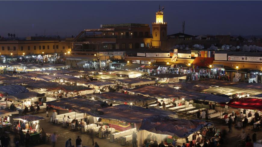 A view of Djamaa Lafna square and its restaurants in Marrakesh's old city December 18, 2014.  Picture taken December 18, 2014. REUTERS/Youssef Boudlal (MOROCCO - Tags: SOCIETY TRAVEL) - RTR4KAMQ