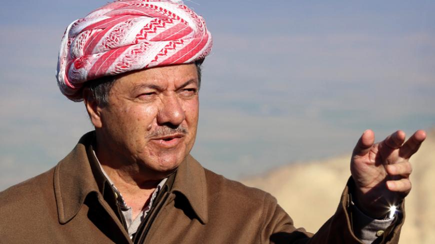 Iraqi Kurdish leader Masoud Barzani speaks to journalists on December 21, 2014 during a visit to Mount Sinjar, west of the northern Iraqi city of Mosul. Barzani hailed advances by peshmerga fighters against the Islamic State jihadist group (IS) as they battled the militants for a northern town, backed by US-led strikes.  AFP PHOTO / SAFIN HAMED        (Photo credit should read SAFIN HAMED/AFP/Getty Images)