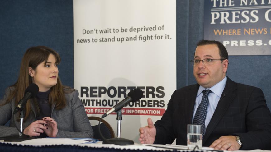 EMBARGOED UNTIL FEBRUARY 12 AT 00:01 AM EST
Ali Rezaian, brother of Washington Post Tehran bureau chief Jason Rezaian who has been detained in Iran since July 2014, speaks alongside Delphine Halgand, USA Director of Reporters Without Borders, as they discuss the World Press Freedom Index 2015 during a press conference at the National Press Club in Washington, DC, February 11, 2015. Published since 2002, the World Press Freedrom Index measures the level of freedom of information in 180 countries. AFP PHOTO /