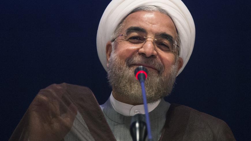 Iran's President Hassan Rouhani smiles while replying to a question during a news conference on the sidelines of the 69th United Nations General Assembly at United Nations Headquarters in New York September 26, 2014. Rouhani said on Friday "courageous decisions" must be made to clinch a long-term nuclear agreement and that any deal without the lifting of all sanctions against Tehran was "unacceptable".  REUTERS/Adrees Latif   (UNITED STATES - Tags: POLITICS HEADSHOT) - RTR47VPV