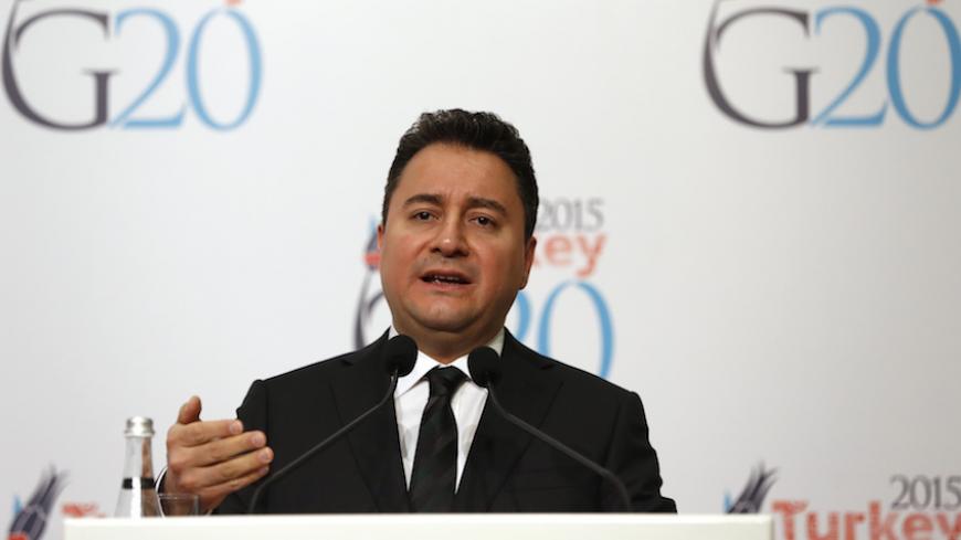 Turkey's Deputy Prime Minister Ali Babacan speaks during a news conference during the G20 finance ministers and central bank governors meeting in Istanbul February 9, 2015. Turkey prefers to set specific national investment targets as part of efforts to boost economic growth but it is not clear if all G20 member nations are willing to sign up to hard numbers, Babacan said on Monday. REUTERS/Murad Sezer (TURKEY  - Tags: POLITICS BUSINESS) - RTR4OTD4