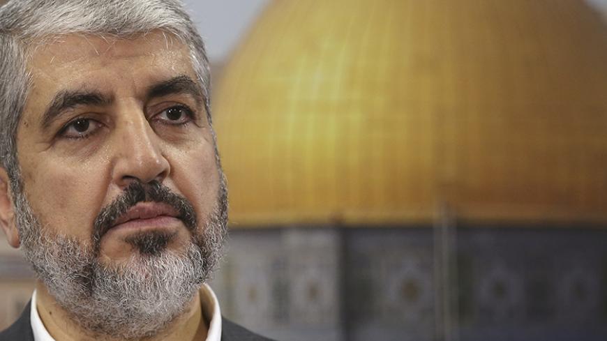 Hamas leader Khaled Meshaal speaks during an interview with Reuters in Doha October 16, 2014. Meshaal on Thursday called on Muslims to defend the al-Aqsa mosque compound in Jerusalem, saying Israel was trying to seize the site, revered in Islam and Judaism and focus of a Palestinian uprising in 2000.      REUTERS/Fadi Al-Assaad (QATAR - Tags: POLITICS RELIGION) - RTR4AH1B