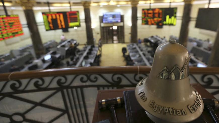 The Egyptian Exchange bell is seen at the stock exchange in Cairo, March 12, 2015. After four years of political turmoil, Egypt is staking its economic revival on an investment summit in Sharm el-Sheikh it hopes will burnish its image and attract billions of dollars. REUTERS/Mohamed Abd El Ghany (EGYPT - Tags: POLITICS BUSINESS) - RTR4T2G3