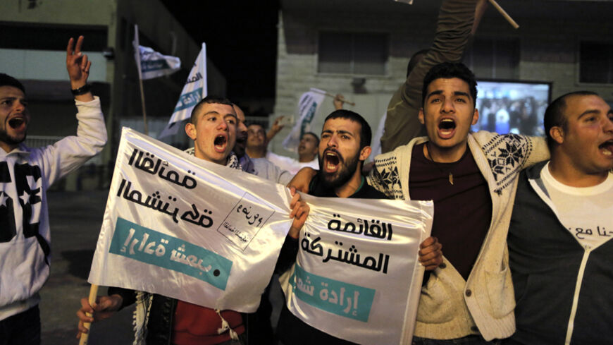 Supporters of the Joint Arab List react after hearing exit poll results in Nazareth March 17, 2015. Prime Minister Benjamin Netanyahu closed a gap with center-left rival Isaac Herzog in a hard-fought Israeli election on Tuesday, exit polls showed, leaving both men with a chance to rule but Netanyahu with the clearer path to forming a coalition. But Herzog also could prevail, should Kulanu and a bloc of Arab Israelis - which the polls predicted would be Israel's third largest party - throw their support behi