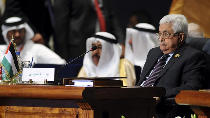 Palestinian President Mahmoud Abbas (R) attends the opening meeting of the Arab Summit in Sharm el-Sheikh, in the South Sinai governorate, south of Cairo, March 28, 2015. Arab League heads of state will hold a two-day summit to discuss a range of conflicts in the region, including Yemen and Libya, as well as the threat posed by Islamic State militants. REUTERS/Stringer - RTR4V98Y
