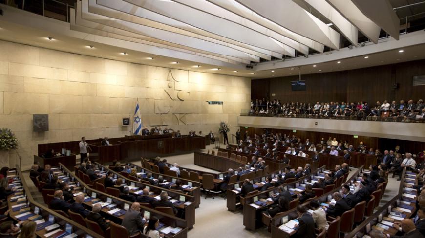 A general view shows the plenum during the swearing-in ceremony of the 20th Knesset, the new Israeli parliament, in Jerusalem March 31, 2015. REUTERS/Heidi Levine/Pool - RTR4VMHC
