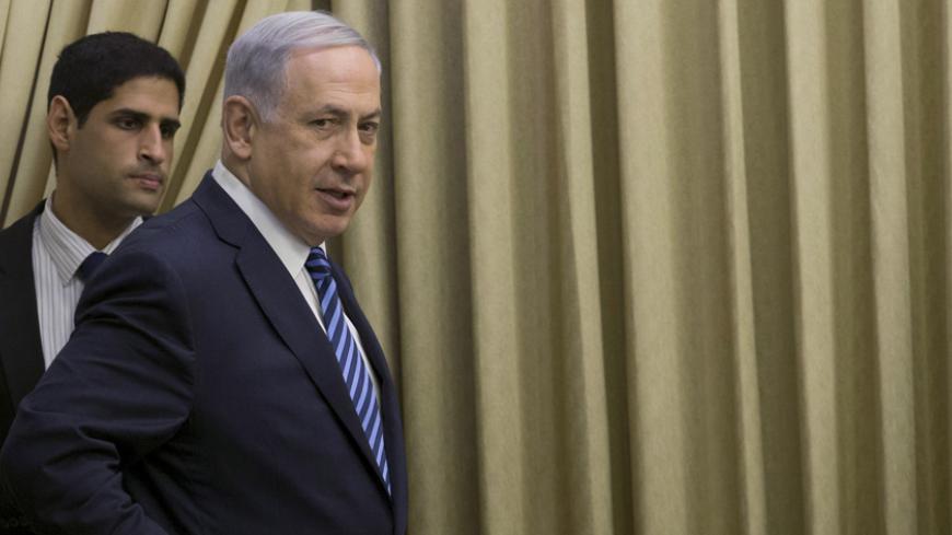 Israel's Prime Minister Benjamin Netanyahu (R) arrives to deliver a statement at the residence of President Reuven Rivlin in Jerusalem April 20, 2015. Netanyahu will have two more weeks to form a new government after he asked Israel's president on Monday to extend a 28-day period to form a coalition following his election victory. REUTERS/Abir Sultan/Pool - RTX19GUA