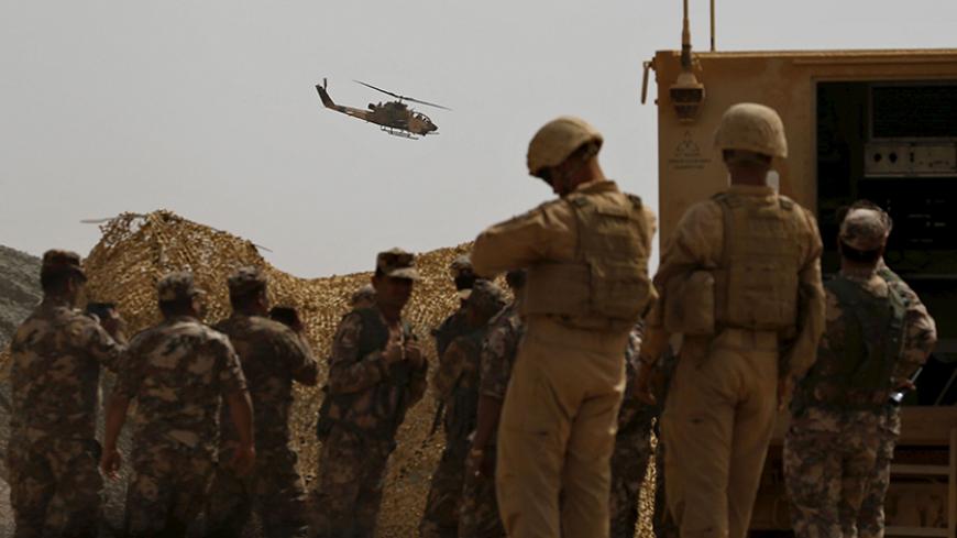 U.S. and Jordanian soldiers participate in Exercise Eager Lion at the Jordan-Saudi Arabia border, south of Amman May 18, 2015. Around 10,000 participants from 18 countries will take part in Eager Lion. REUTERS/Muhammad Hamed - RTX1DI9O