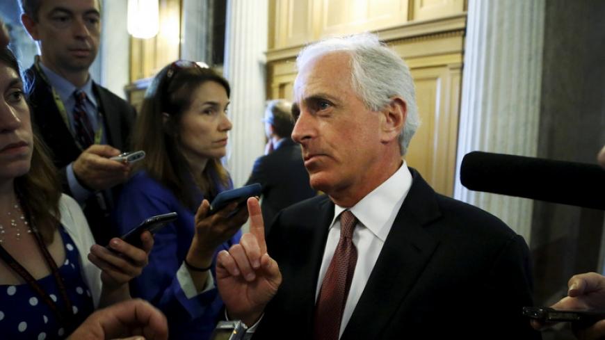 U.S. Senator Bob Corker (R-TN) talks to reporters after the weekly Republican caucus policy luncheon at the U.S. Capitol in Washington May 12, 2015.  REUTERS/Jonathan Ernst - RTX1CO22