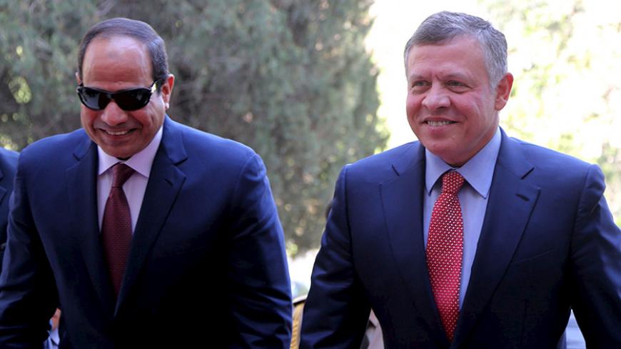 Jordan's King Abdullah (R) walks with Egypt's President Abdel Fattah al-Sisi upon their arrival at the Royal Palace in Amman in this May 21, 2015 handout photo by Jordan's Royal Palace. REUTERS/Yousef Allan/Jordan's Royal Palace/Handout via Reuters 
ATTENTION EDITORS - THIS PICTURE WAS PROVIDED BY A THIRD PARTY. THIS PICTURE IS DISTRIBUTED EXACTLY AS RECEIVED BY REUTERS, AS A SERVICE TO CLIENTS. EDITORIAL USE ONLY. NOT FOR SALE FOR MARKETING OR ADVERTISING CAMPAIGNS. 
 - RTX1E0TE