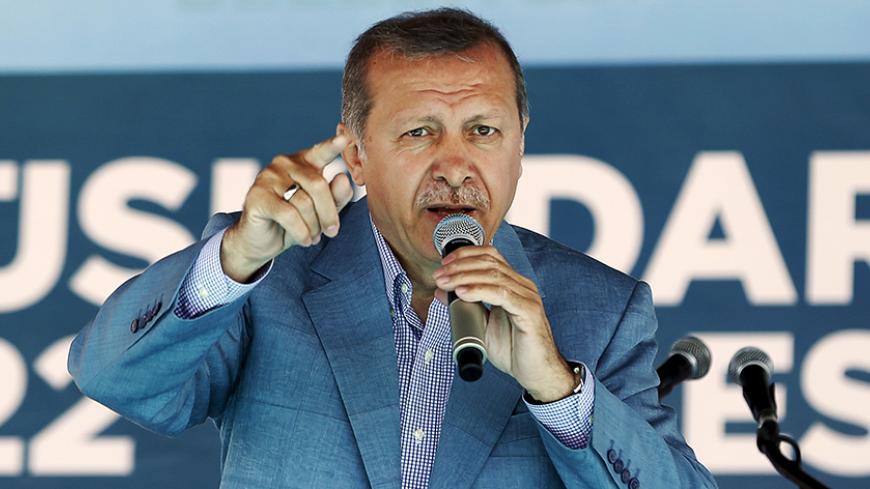 Turkey's President Tayyip Erdogan speaks during an opening ceremony in Istanbul, Turkey, May 26, 2015. Turkey's general election looks likely to push Tayyip Erdogan's dream of an all-powerful presidency further from his reach, and usher in a period of turbulence as its most divisive modern leader jockeys to maintain his dominance. Barred by the constitution from party politics as head of state, Erdogan has nonetheless campaigned across Turkey before the June 7 parliamentary vote in a sign of how much he has