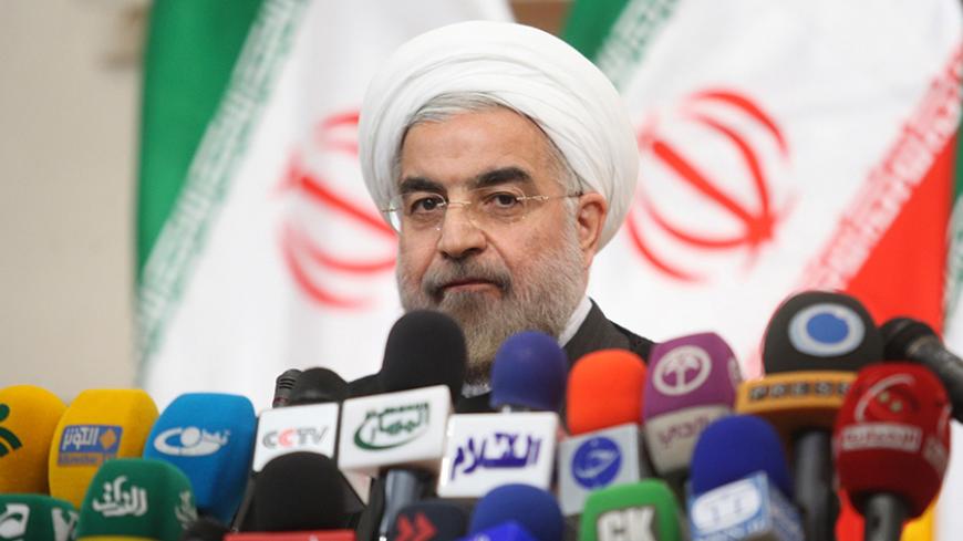 Iranian President-elect Hassan Rouhani speaks with the media during a news conference in Tehran June 17, 2013.   REUTERS/Fars News/Majid Hagdost  (IRAN - Tags: POLITICS PROFILE) ATTENTION EDITORS - THIS IMAGE WAS PROVIDED BY A THIRD PARTY. FOR  EDITORIAL USE ONLY. NOT FOR SALE FOR MARKETING OR ADVERTISING CAMPAIGNS. THIS PICTURE IS DISTRIBUTED EXACTLY AS RECEIVED BY REUTERS, AS A SERVICE TO CLIENTS - RTX10QW5