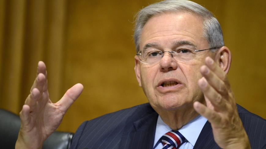 Senator Robert Menendez (D-NJ), a member of the Senate Foreign Relations Committee, makes remarks during hearings on "Corruption, Global Magnitsky and Modern Slavery - A Review of Human Rights Around the World", on Capitol Hill in Washington, July 16, 2015. Representatives from the State Department and human rights organizations testified on countries like Iraq, Malaysia and Cuba.  REUTERS/Mike Theiler - RTX1KL3A