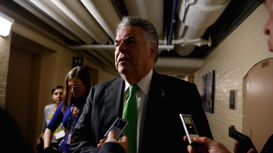 U.S. Representative Peter King (R-NY) talks with reporters as he departs after a Republican caucus candidates' forum for the next House speaker, at the U.S. Capitol in Washington, October 8, 2015.  REUTERS/Jonathan Ernst - RTS3KT7