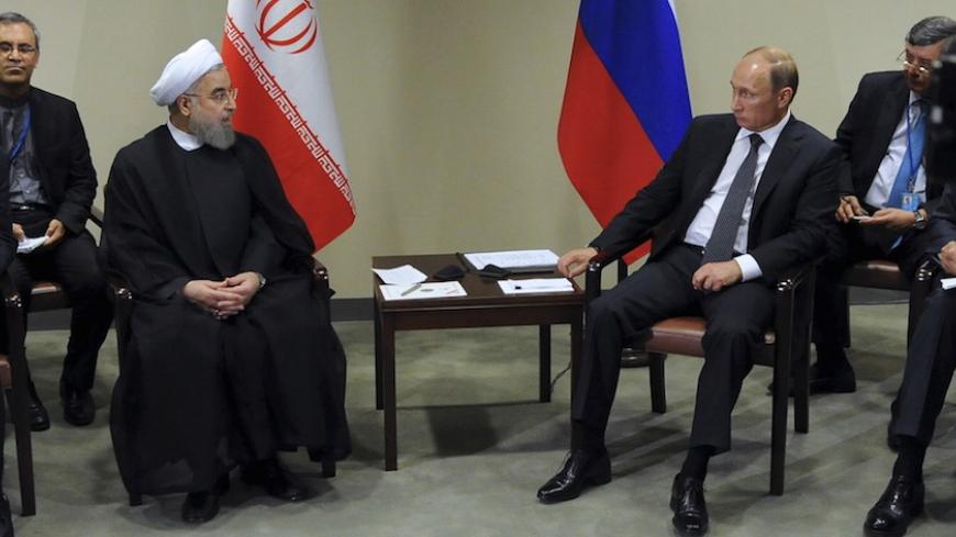 Russia's President Vladimir Putin (2nd R) meets with Iran's President Hassan Rouhani (2nd L) on the sidelines of the United Nations General Assembly in New York, September 28, 2015. REUTERS/Mikhail Klimentyev/RIA Novosti/Kremlin ATTENTION EDITORS - THIS IMAGE HAS BEEN SUPPLIED BY A THIRD PARTY. IT IS DISTRIBUTED, EXACTLY AS RECEIVED BY REUTERS, AS A SERVICE TO CLIENTS.   - RTX1SY30