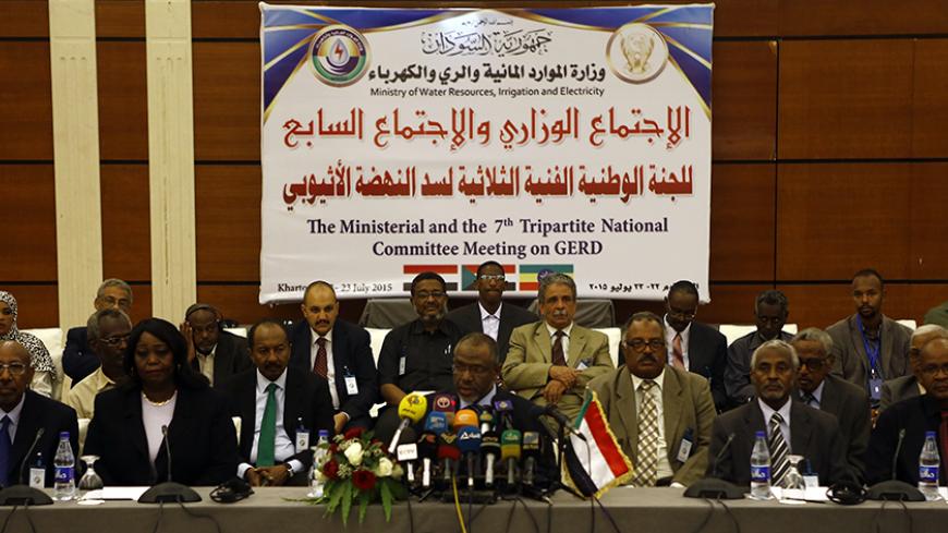 Sudanese Water Minister Moataz Moussa (C) attends 7th meeting of the tripartite technical committee on the Grand Ethiopian Renaissance Dam (GERD) on July 22, 2015 in the capital Khartoum. AFP PHOTO / ASHRAF SHAZLY        (Photo credit should read ASHRAF SHAZLY/AFP/Getty Images)