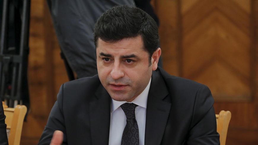 Selahattin Demirtas, co-chair of the pro-Kurdish Peoples' Democratic Party (HDP), speaks during a meeting with Russian Foreign Minister Sergei Lavrov (not pictured) in Moscow, Russia, December 23, 2015. Turkey's political leadership was wrong to order the shooting down of a Russian warplane near the Turkish-Syrian border, Demirtas said on Wednesday. REUTERS/Maxim Shemetov - RTX1ZUU6
