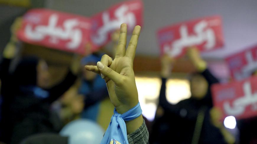 An Iranian woman gestures as she attends a reformist campaign for upcoming parliamentary election, in Tehran February 18, 2016. REUTERS/Raheb Homavandi/TIMA  ATTENTION EDITORS - THIS IMAGE WAS PROVIDED BY A THIRD PARTY. FOR EDITORIAL USE ONLY.  - RTX27K9Y