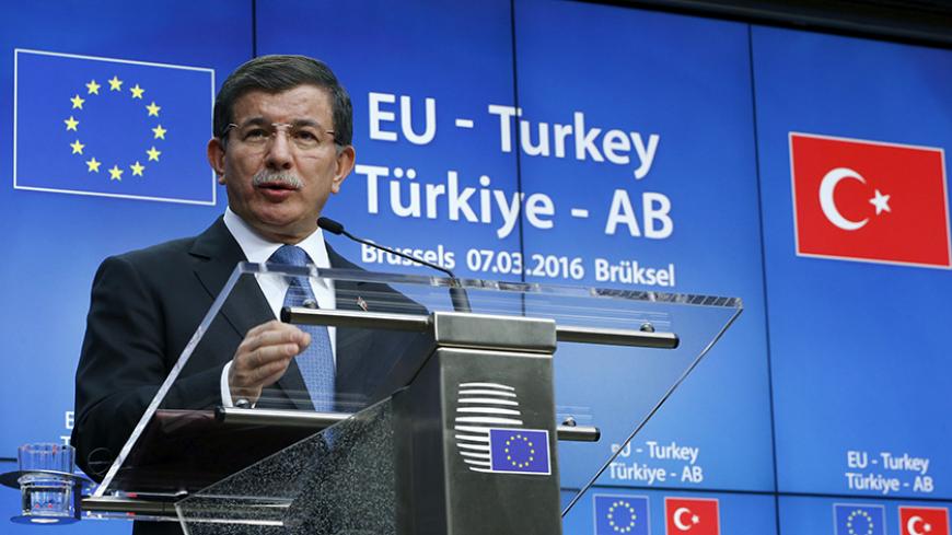 Turkish Prime Minister Ahmet Davutoglu speaks at a news conference at the end of a EU-Turkey summit in Brussels March 8, 2016. REUTERS/Yves Herman - RTS9QKE